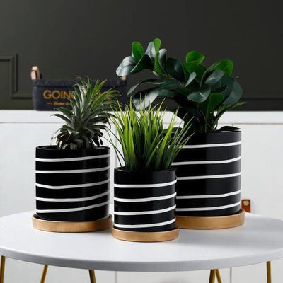 cache pot sur pied rayure noire et blanche