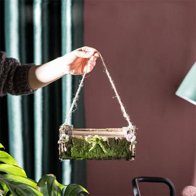 pot de fleurs suspendu en bois